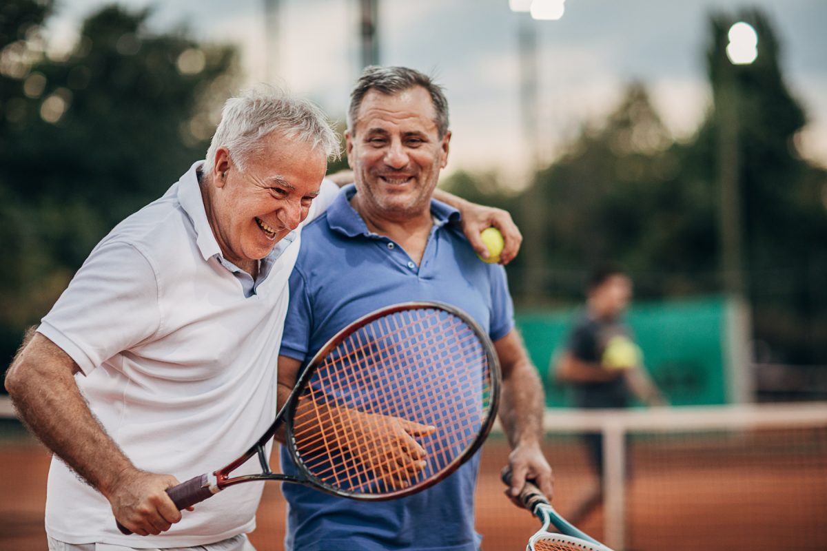 two man playing tennis